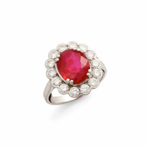 WOLFERS RUBY & DIAMOND RINGIn 18K white gold, set with a intense red oval Burmese ruby 
€58.500